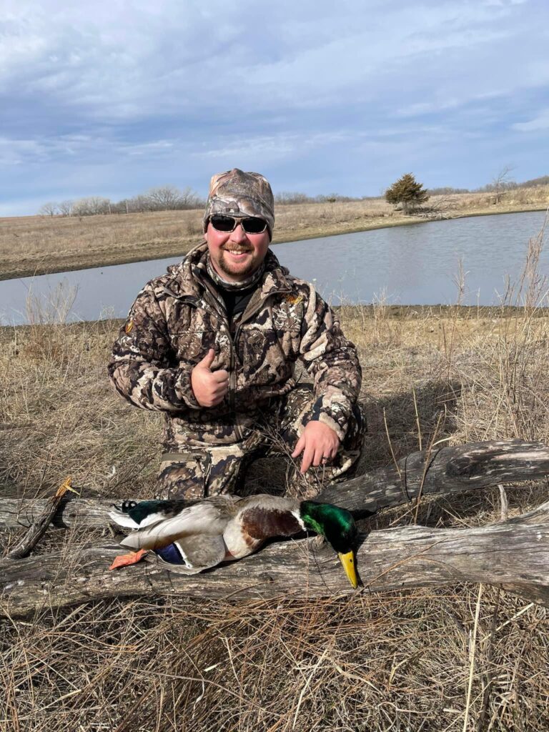 Tyler duck hunting and mounted a pretty mallard duck he shot.